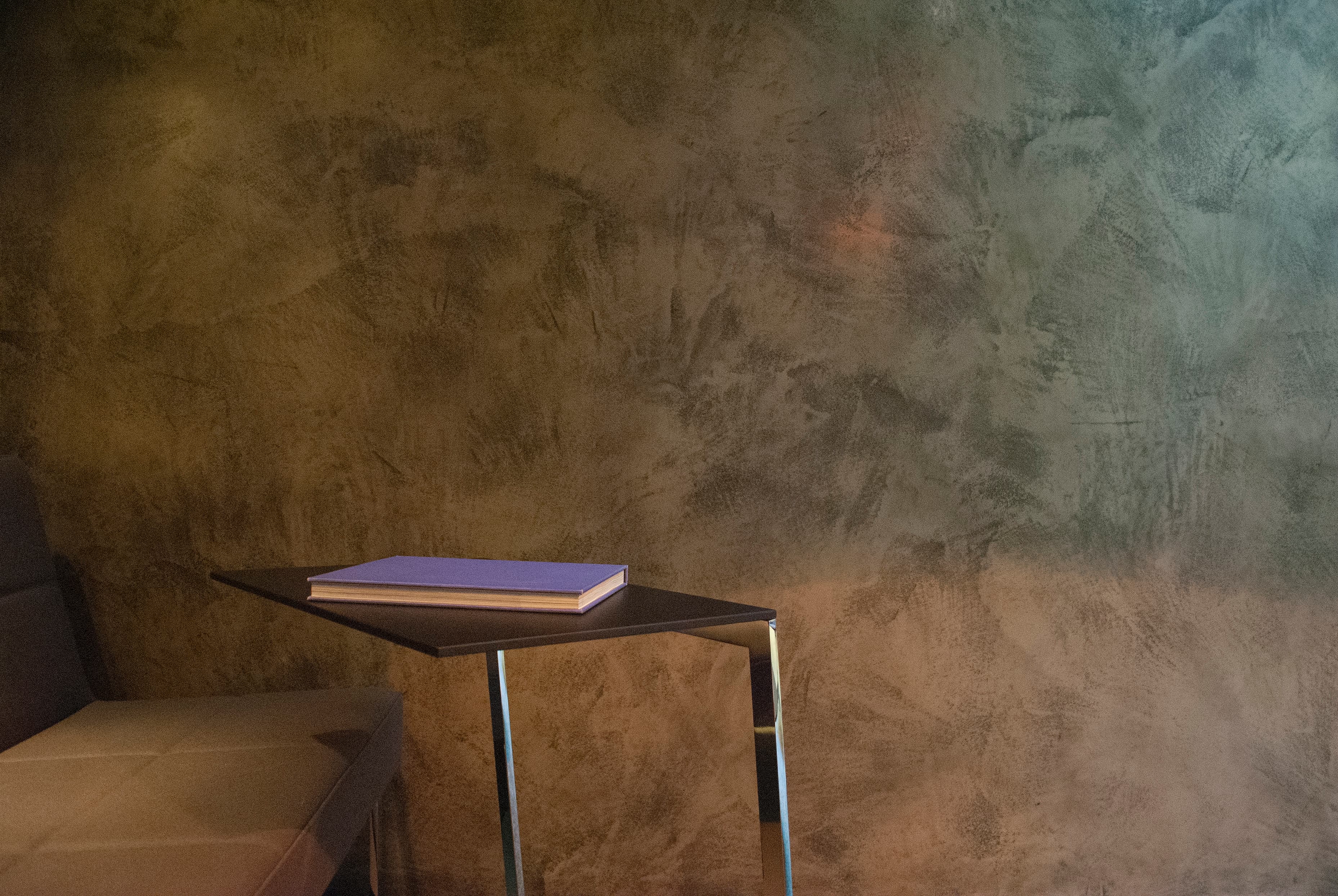 Armourcoat polished plaster wall finish in a luxury Singapore showroom interior