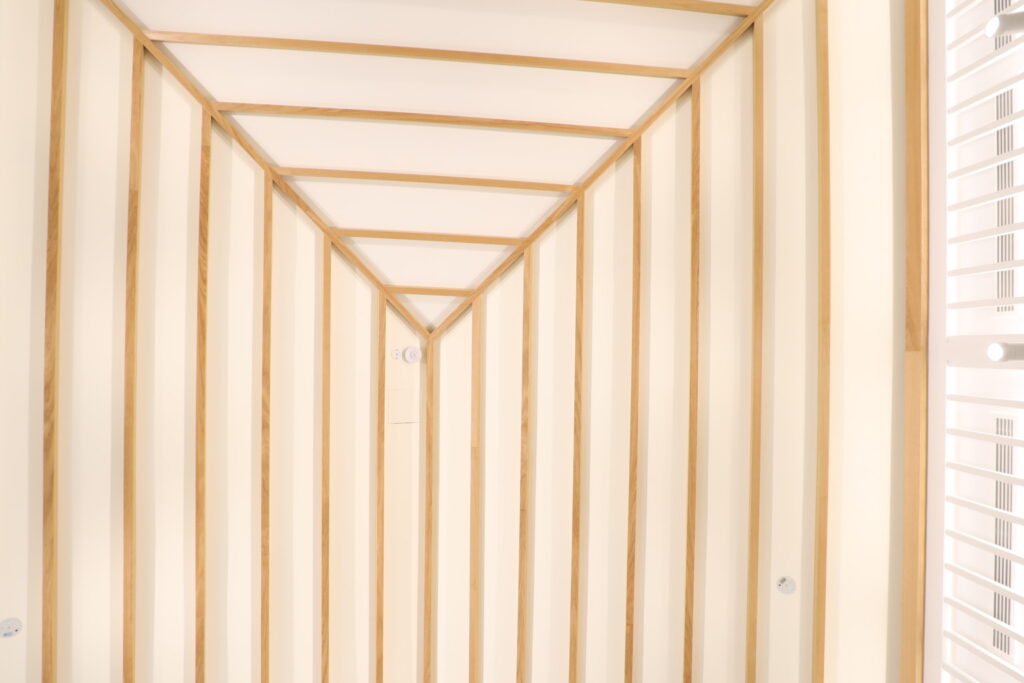 Acoustic plaster ceiling detail in a Singapore interior