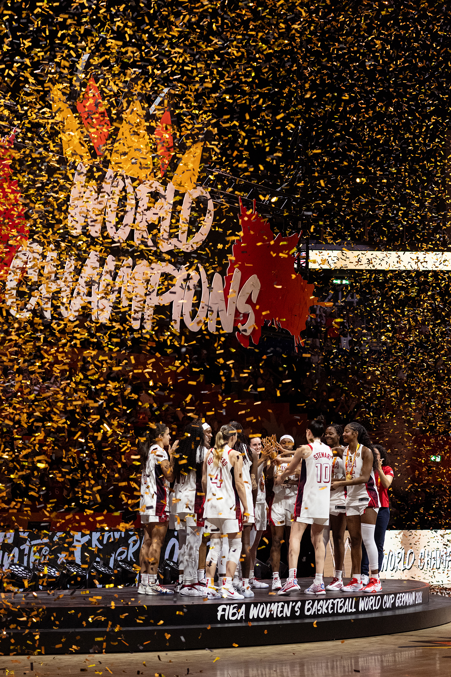 Champions celebrating on the Junckers court at the FIBA Women's Basketball World Cup 2026