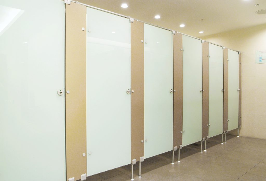 Marathon M600 full-glass toilet cubicle system with phenolic doors